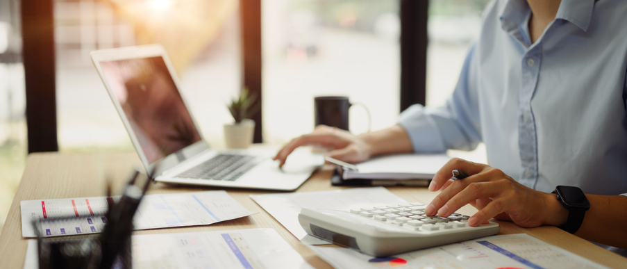 woman filing taxes - do you pay taxes on a personal injury settlement?
