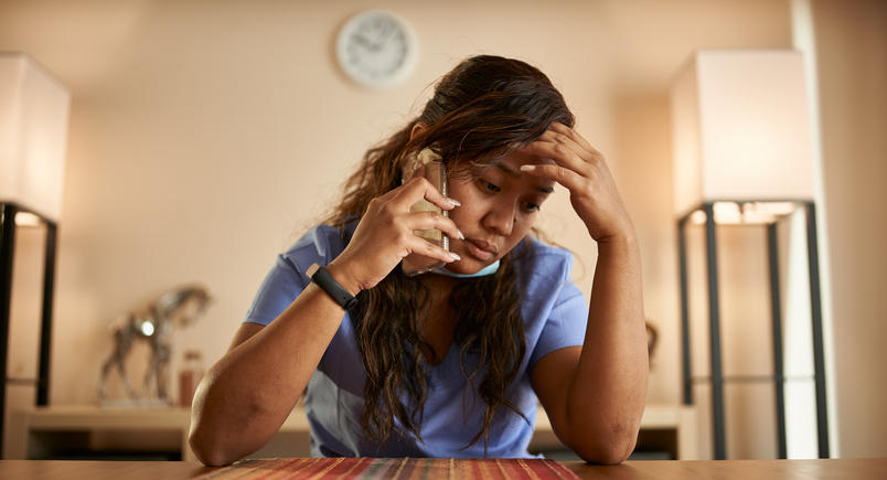 stressed woman on her phone - can you claim for emotional distress after car accident